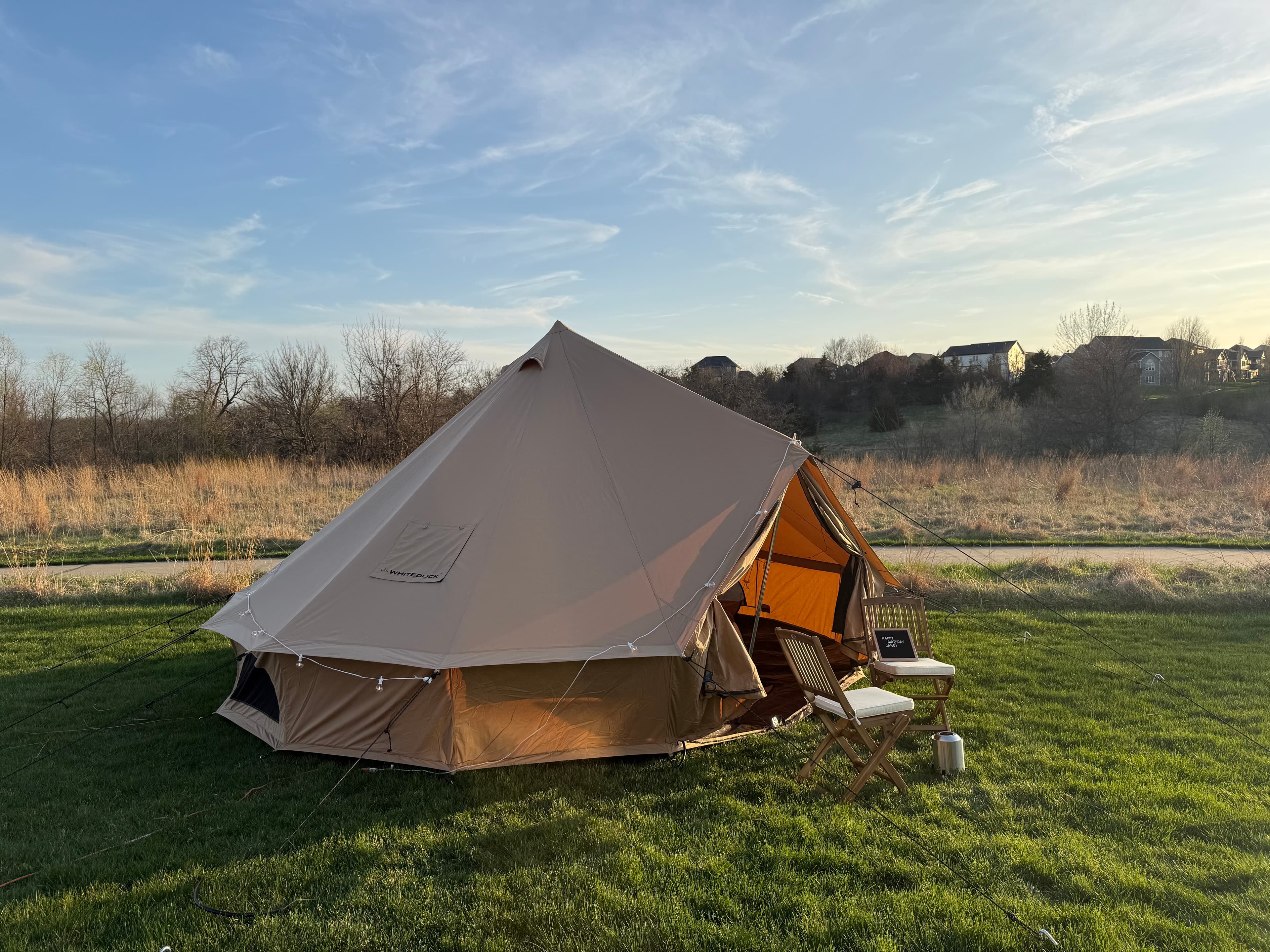 Wide exterior shot of the bell tent setup