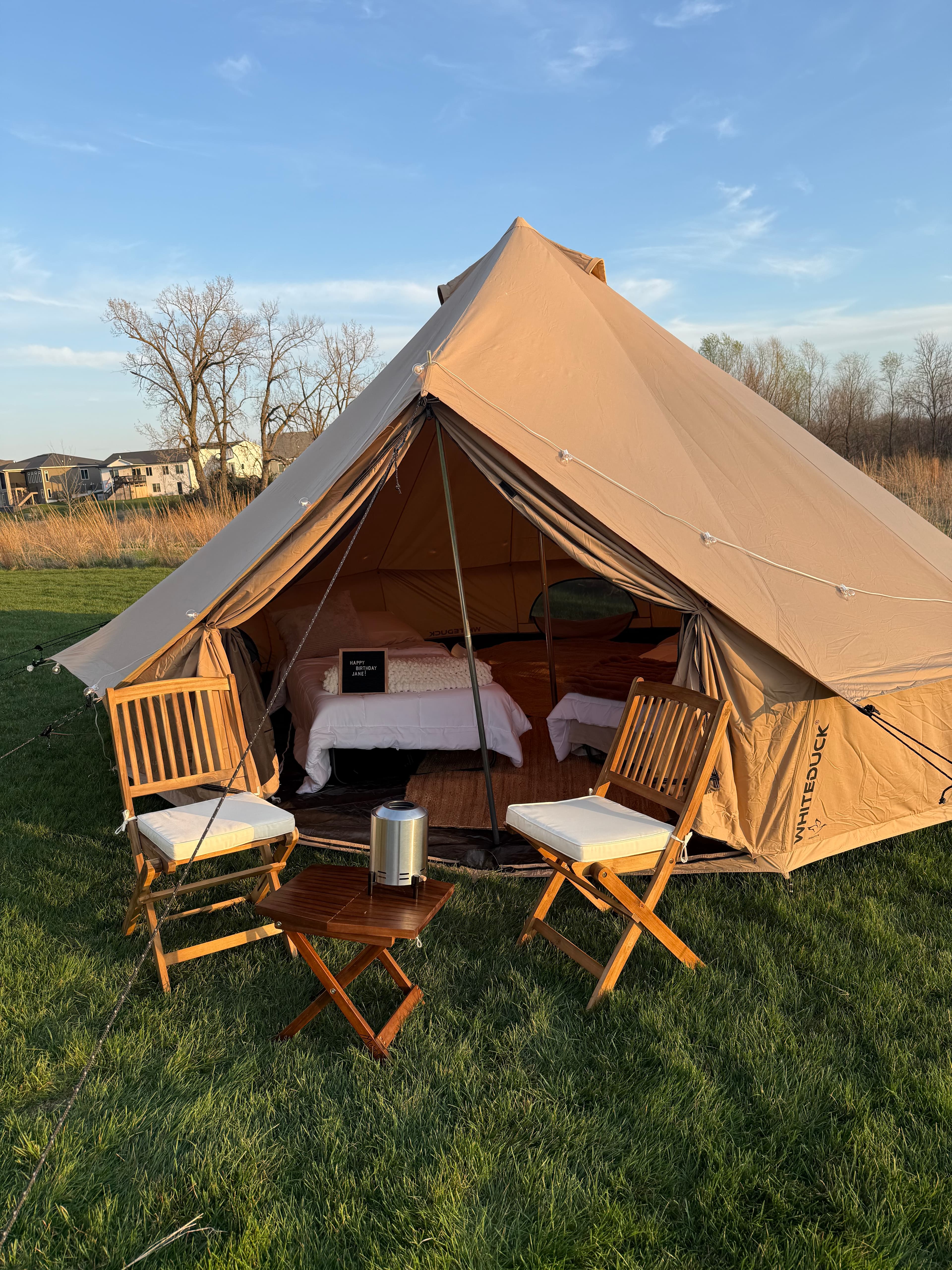 Front-side view of the bell tent at golden hour